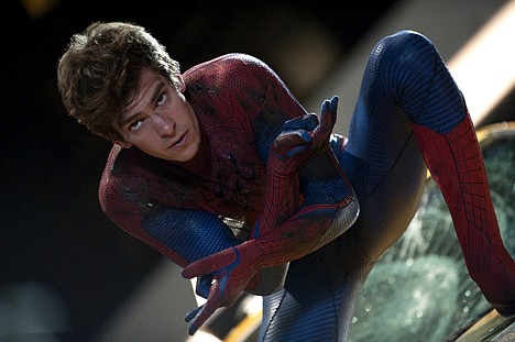 &lt;p&gt;In this film image released by Sony Pictures, Andrew Garfield is shown in a scene from &quot;The Amazing Spider-Man, set for release on July 3, 2012. &quot;The Amazing Spider-Man&quot; pulled in $7.5 million from its debut screenings just after midnight Tuesday, July 3. (AP Photo/Columbia - Sony Pictures, Jaimie Trueblood)&lt;/p&gt;