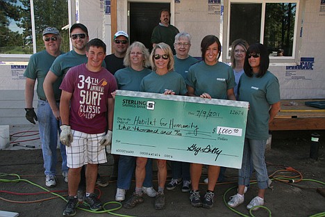 &lt;p&gt;Sterling Savings Bank volunteers worked Saturday at the Habitat for Humanity of North Idaho home on 12th and Hazel. The bank also donated a check for $1,000.&lt;/p&gt;