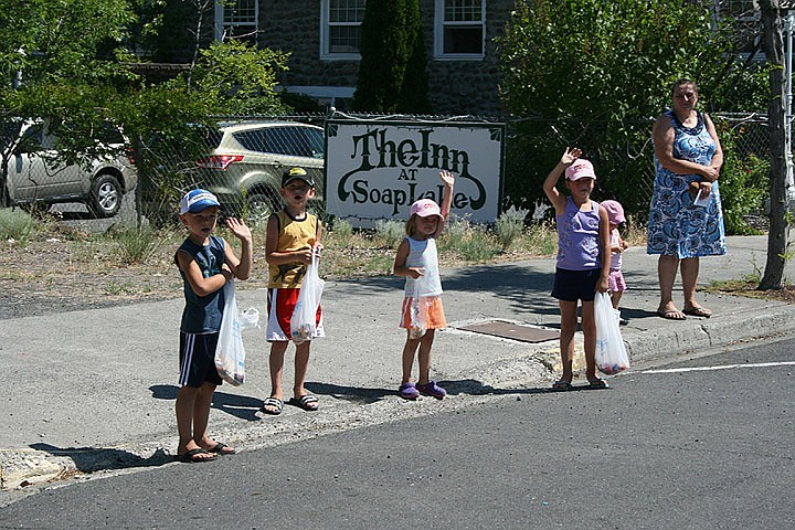 Miss Warden waved, and these children waved back during the Smokiam Days parade Saturday.