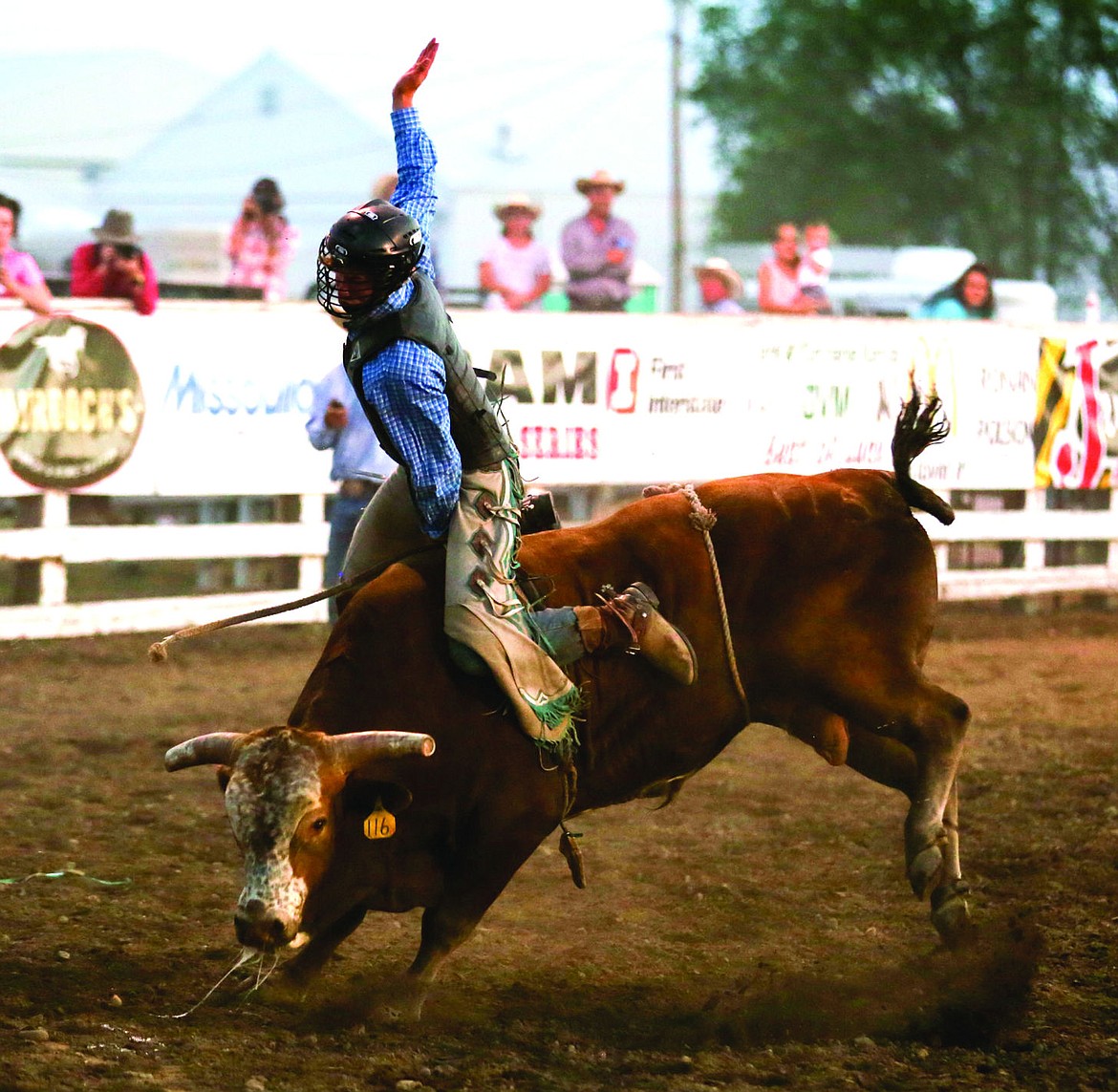 &lt;p&gt;Bridger Fitzpatrick of Polson competes in bull riding Saturday night at the Mission Mountain rodeo.&lt;/p&gt;