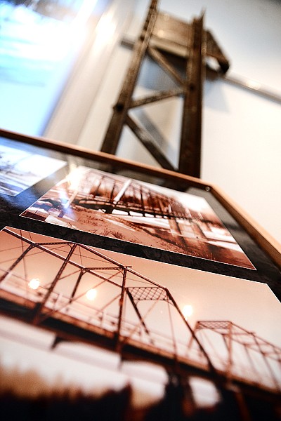 <p>Photographs and a piece of the Old Steel Bridge make up part of the "History of the Flathead Valley" exhibition at the Museum at Central School. (Brenda Ahearn/Daily Inter Lake)</p>