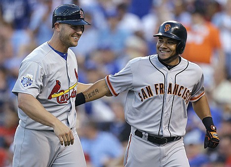 &lt;p&gt;National League's Melky Cabrera, right, of the San Francisco Giants, celebrates his two-run home run with Matt Holliday, of the St. Louis Cardinals, during the fourth inning of the MLB All-Star baseball game, Tuesday, July 10, 2012, in Kansas City, Mo. (AP Photo/Jeff Roberson)&lt;/p&gt;