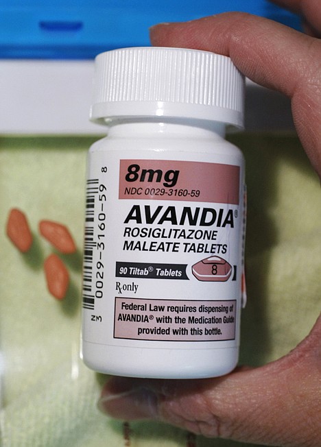 &lt;p&gt;In this June 30, 2010 file photo, a pharmacist holds a bottle of Avandia pills at Maximart Pharmacy in Palo Alto, Calif.&lt;/p&gt;