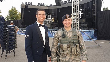 &lt;p&gt;Tops in Blue vocalist Jordan Premo, left, of Post Falls, waits to snap a photo June 15 with Chris Hotine, of Post Falls, who works security detail at the Mountain Home Air Force Base in southwestern Idaho. &Ograve;Jordan has been given a chance to bring a little bit of &Ocirc;hometown&Otilde; to those away from home,&Otilde;&Oacute; Jordan&Otilde;s mom, Kelley Kempton, said. &Ograve;It gives our soldiers a sense of pride and lets them know they are not forgotten.&Oacute;&lt;/p&gt;