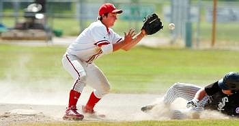 Kalispell Lakers shortstop Brady Mott gets set to make a play on Great Falls White Sox player Josh Winterrowd as he slides into second base during the John R. Harp Tournament Friday afternoon in Kalispell. Nate Chute/Daily Inter Lake