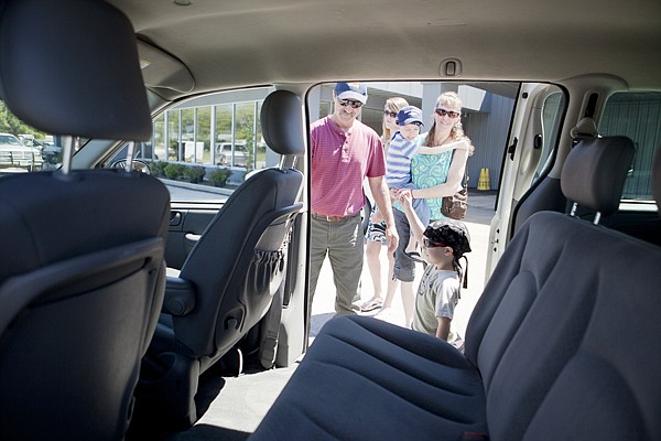 &lt;p&gt;The Brown family checks out their new 2006 Dodge Caravan at Don
K Chevrolet in Whitefish Thursday afternoon.&lt;/p&gt;