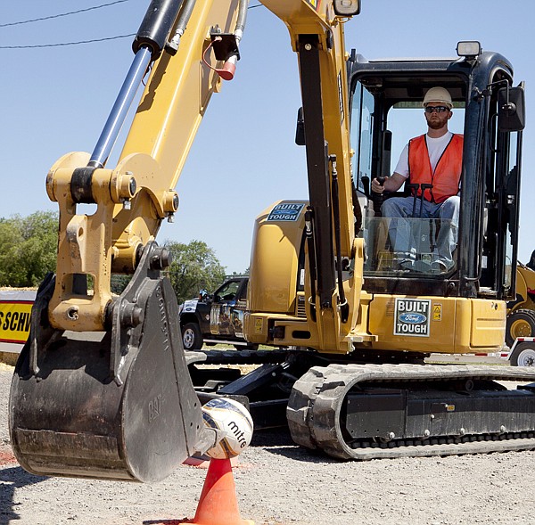 &lt;p&gt;Justin Doble participates in the &quot;Mini-Excavator Ball Challenge&quot;
at the Western States Rodeo held at the Flathead County Fairgrounds
Thursday afternoon. The Western States Rodeo is a competition made
up of five events designed to test the contestants skills using
heavy equipment such as skid steers, backhoes and a
mini-excavator.&lt;/p&gt;