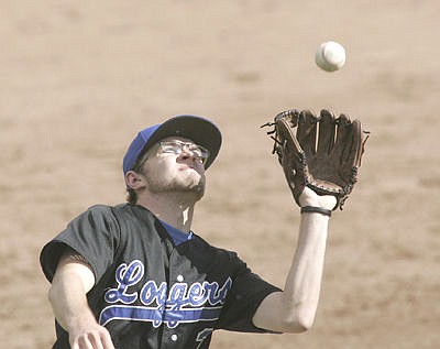 &lt;p&gt;Third baseman Will Reichel with the third out top of sixth inning vs. Strathmore Reds Saturday. Second of a double header. Inaugural Border War alumni game. (Paul Sievers/The Western News)&lt;/p&gt;