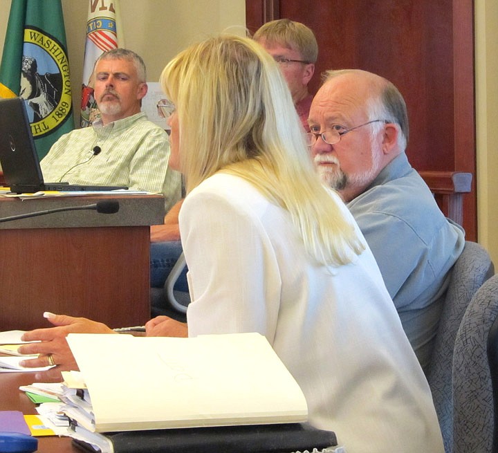 Othello city councilmembers and staff listen as City Attorney Katherine Kenison speaks about the city's options for community marijuana gardens.
