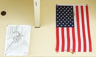 &lt;p&gt;A couple of items tacked to the walls of Big Creek Baldy lookout. (Paul Sievers/The Western News)&lt;/p&gt;