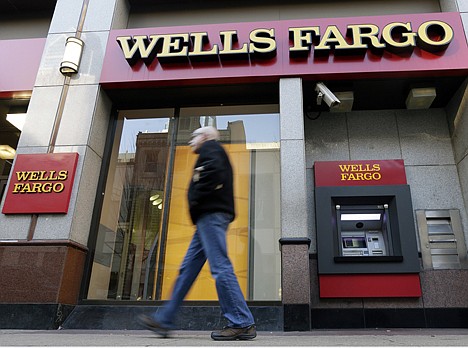 &lt;p&gt;A man walks past a Wells Fargo location in Philadelphia on Dec. 19, 2012.&lt;/p&gt;