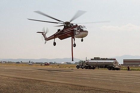 &lt;p&gt;A Sikorksy Sky Crane lifts off from a runway at the Coeur d&#146;Alene Airport. The dangling hose is used to suck water into a tank and is capable of pumping about 2,000 gallons of water in one minute.&lt;/p&gt;