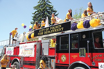 &lt;p&gt;Polson athletes pump up parade-goers with their rousing chants from atop a Polson fire truck.&lt;/p&gt;