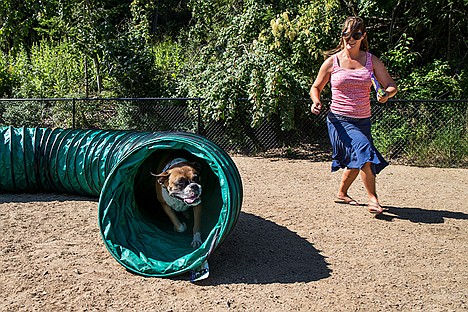 &lt;p&gt;Jennifer Young trains her six-year-old&#160;Boxer Kai at Coeur d&#146;Alene&#146;s newest dog park in McEuen Park. Young is the owner of&#160;Happy Dog Training Services&#160;and was one of the booths at the dog park dedication on Saturday morning.&lt;/p&gt;