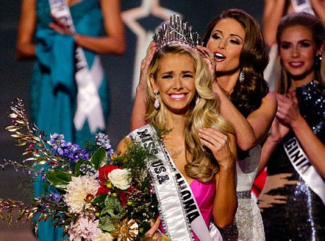 &lt;p&gt;Miss Oklahoma Olivia Jordan is crowned Miss USA by Miss USA 2014 Nia Sanchez during the 2015 Miss USA pageant in Baton Rouge, La., Sunday.&lt;/p&gt;