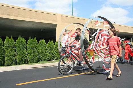 &lt;p&gt;John Michael, 13, pedals a rather unusual tricycle as Max Bolkovatz, 11, walks next to him in the Kinetic Festival Parade in Riverstone on Sunday.&lt;/p&gt;