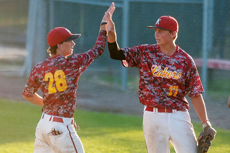 &lt;p&gt;Kalispell first baseman Leif Erickson (17) high fives a teammate after closing out the fourth inning Saturday evening during the Lakers game against Vauxhall in the John R. Harp tournament at Griffin Field in Kalispell. (Patrick Cote/Daily Inter Lake)&lt;/p&gt;