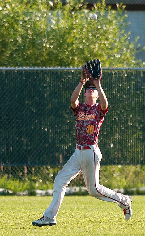 &lt;p&gt;Kalispell's Jayson Combs makes a catch in the outfield Saturday evening during the Lakers game against Vauxhall in the John R. Harp tournament at Griffin Field in Kalispell. (Patrick Cote/Daily Inter Lake)&lt;/p&gt;