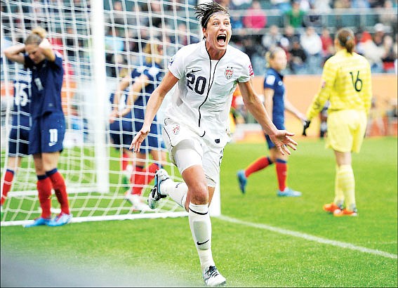 &lt;p&gt;Abby Wambach celebrates after scoring to give the United States the lead in a 3-1 win over France in the Women's World Cup semifinals Wednesday at Moenchengladbach, Germany.&lt;/p&gt;