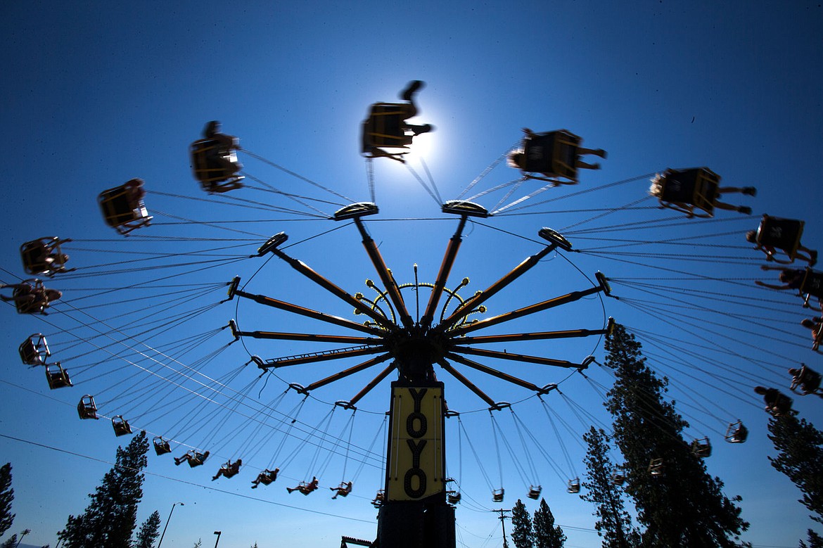 &lt;p&gt;Kids fly in orbit around the &quot;YOYO&quot; on Saturday, July 20, 2013, at Rathdrum Days.&lt;/p&gt;