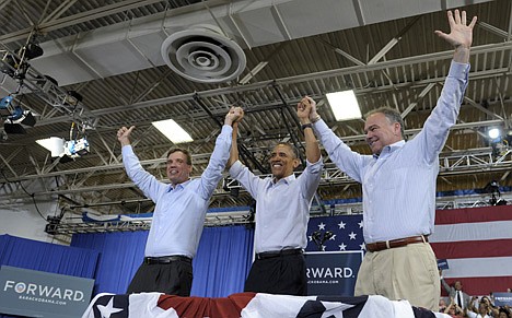 &lt;p&gt;President Barack Obama, accompanied by Sen. Mark Warner, D-Va., left, and Virginia Democratic candidate, former Virginia Gov. Tim Kaine, right, take part in a campaign event at Green Run High School in Virginia Beach, Va., Friday, July 13, 2012. Obama is spending the day in Virginia campaigning. (AP Photo/Susan Walsh)&lt;/p&gt;