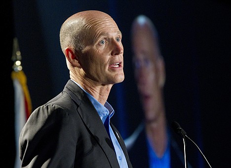 &lt;p&gt;FILE - In this May 16, 2012, file photo Florida Gov. Rick Scott speaks in Fort Lauderdale, Fla. In a victory for Republicans, the federal government has agreed to let Florida use a law enforcement database to challenge people?s right to vote if they are suspected of not being U.S. citizens. The agreement, made in a letter Scott?s administration that was obtained by The Associated Press, grants the state access to a list of resident non citizens maintained by the Department of Homeland Security. The Obama administration had denied Florida?s request for months. (AP Photo/J Pat Carter, File)&lt;/p&gt;