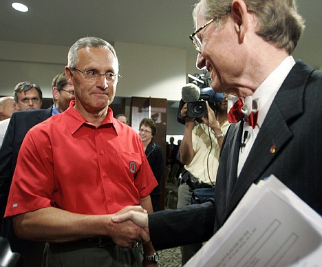 &lt;p&gt;FILE - In this July 12, 2007, file photo, Ohio State football coach Jim Tressel, left, talks with new incoming Ohio State University President E. Gordon Gee after Gee spoke at the university Longenberger Alumni House, where trustees announced his return to the OSU presidency in Columbus, Ohio. As the country absorbs the independent report released Thursday, July 12, 2012, on the Penn State sex abuse scandal, some see it as more than an indictment of one school. They see it as underscoring how major-college sports, football in particular, have run amok. When Gee heard Tressel concede he had reason to believe several star players were taking money and free tattoos from a suspected drug dealer and yet he had told no one, Gee was asked if he had considered firing Tressel. &quot;Let me just be very clear,&quot; Gee said with a grin, &quot;I'm just hopeful the coach doesn't dismiss me.&quot; The joke fell flat, but echoed around the country. It confirmed what many already believed about the balance of power in college sports today: some football teams run universities, not the other way around. (AP Photo/Columbus Dispatch, Doral Chenoweth III, File)&lt;/p&gt;