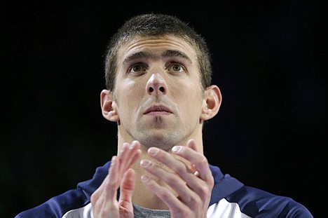 &lt;p&gt;MARK HUMPHREY/Associated Press Michael Phelps claps during the medal ceremony for the men's 100-meter butterfly at the U.S. Olympic swimming trials July 1 in Omaha, Neb. Phelps won the gold in the event.&lt;/p&gt;