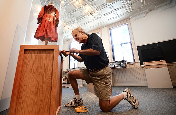 &lt;p&gt;Gil Jordan works on finishing touches to the&#160;&quot;History of the Flathead Valley&quot; exhibition which is set to open this Friday, July 12, with a free reception beginning at 6:30 p.m. (Brenda Ahearn/Daily Inter Lake)&lt;/p&gt;