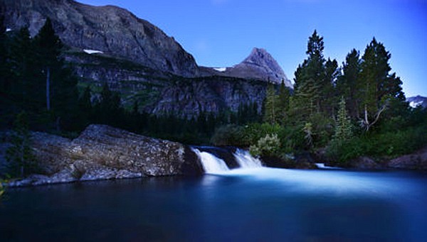 &lt;p&gt;Swiftcurrent Creek flows through the Swiftcurrent Valley in this time-exposure photograph taken near dawn Sunday morning in the Many Glacier area of Glacier National Park.&lt;/p&gt;