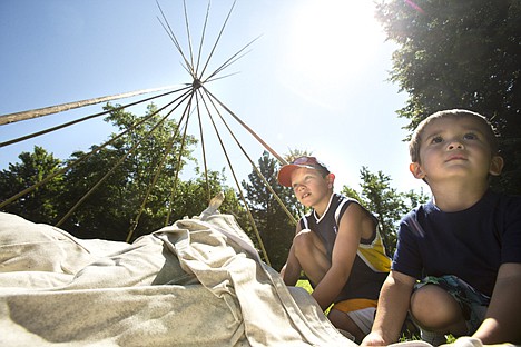 &lt;p&gt;GABE GREEN/Press Byron Anderson, 8, left, and Brannick Swift, 2, help unfold a canvas cover for a tepee built during a demonstration at the Human Rights Education Institute Wednesday morning with support from the Coeur d'Alene tribe.&lt;/p&gt;