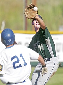 Shortstop Robbie Gauthier receiving on a throw from second baseman Austin Von Tom, Libby's Byron Benefield out at second.