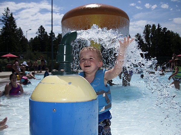 &lt;p&gt;Talyn Richardson, 2, from Kalispell splashes in the water for his first time at Woodland Water Park on Monday, July 9.&lt;/p&gt;