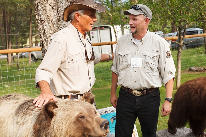 &lt;p&gt;Tim Manley, grizzly bear management specialist for northwest Montana, right, talks with Jack Hanna Friday evening during the Grizzly Bear Rendezvous, a fundraising event for the Montana Fish, Wildlife and Parks Foundation. The event was held at Hanna's ranch near Bigfork.&lt;/p&gt;