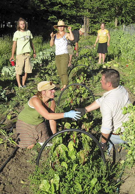 &lt;p&gt;Participants greet each other at a &quot;weed dating&quot; event at the Earthly Delights Farm are shown gardening in Boise, Idaho on Thursday, June 28, 2012. The farm is among a handful across the country offering this unconventional form of speed dating, where singles meet while working together in the fields. The payoff for their toil? A chance at romance. (AP Photo/Jessie L. Bonner)&lt;/p&gt;