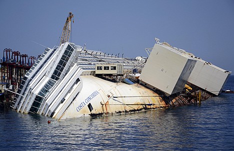 &lt;p&gt;The Costa Concordia cruise ship lies on its side in the Tuscan Island of Isola del Giglio, Monday. Salvage crews are working against time to right and remove the shipwrecked Costa Concordia cruise ship, which is steadily compressing down on itself from sheer weight onto its granite seabed perch off the Tuscan island of Giglio. Salvage master Nick Sloane said Monday that the Concordia has compressed some 10 feet since it came to rest on the rocks Jan. 13, 2012 after ramming a jagged reef during a stunt ordered by the captain that cost the lives of 32 people.&lt;/p&gt;