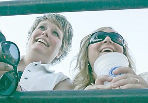&lt;p&gt;Tina Grande, left, and Stacy Salmonsen enjoy the acoustic guitar of Kip Winger during the third annual Big Sky Bash at J. Neils Park Saturday.&lt;/p&gt;