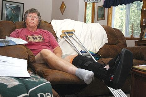 Nick Ianniello/Mineral Independent Kelly Garcia relaxes at his home while his ankle heals. A recent injury while hiking to the Bonanza Lakes left Garcia hiking through the woods with a torn Achilles tendon.