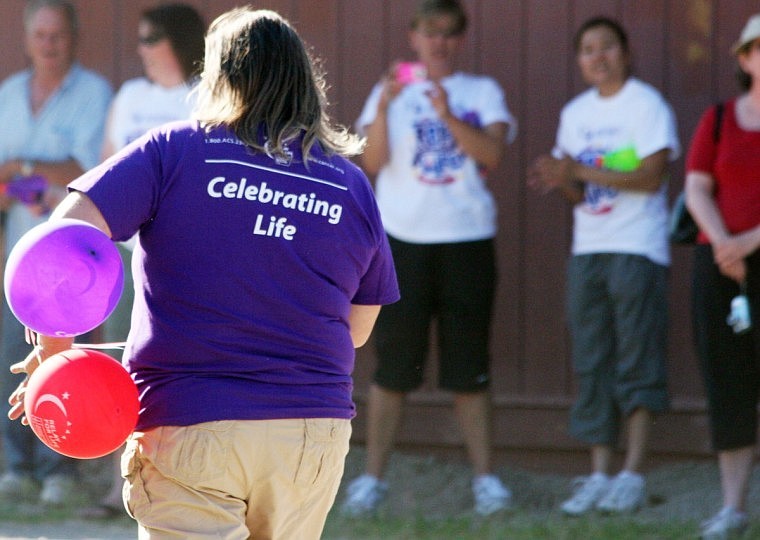 Marcia Boyce, a survivor, walks down the Superior track.