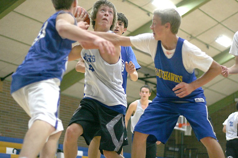 &lt;p&gt;A player from Superior is swarmed by Thompson Falls defenders during the Clark Fork Classic on Saturday.&lt;/p&gt;