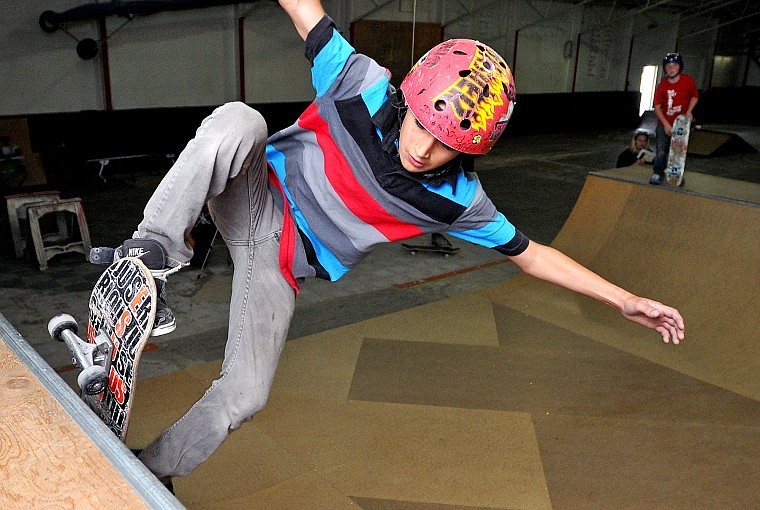 Dillan Guzman, 12, rides up on the halfpipe during an open skate session Tuesday afternoon at Serious JuJu&#146;s facility on Airport Road in Kalispell. The ministry recently celebrated its third anniversary.