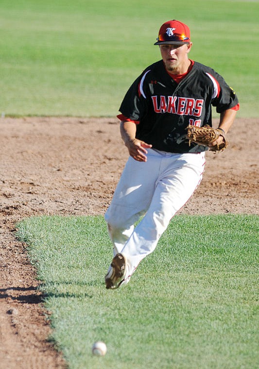 <p>Lakers third baseman Sean O'Connell charges forward to field a bunt Wednesday night during the Lakers doubleheader against Great Falls at Griffin Field. July 17, 2013 in Kalispell, Montana. (Patrick Cote/Daily Inter Lake)</p>