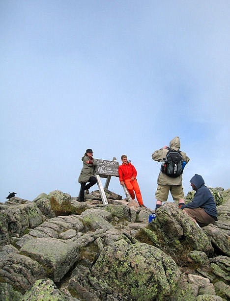<p>Hikers posing for triumphant photos atop Mount Katahdin in Baxter State Park in Maine, Aug. 27, 2014.</p>