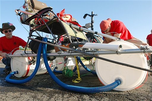 &lt;p&gt;This July 14, 2012 file photo shows the tandem lawn chair rig that two men flew from a gas station in Bend, Ore., while suspended from helium-filled party balloons in an attempt to reach Montana. The men ran into thunderstorms and decided to land, shooting out balloons with the BB rifles in plastic pipe scabbards mounted beside the lawn chairs. (AP Photo/Jeff Barnard, File)&lt;/p&gt;