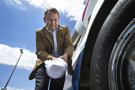 &lt;p&gt;Spokane Mayor David Condon christens the Queen of The Inland Empire hydroplane Wednesday afternoon in front of the Spokane Convention Center.&lt;/p&gt;