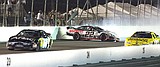 Edwards uses spin to win