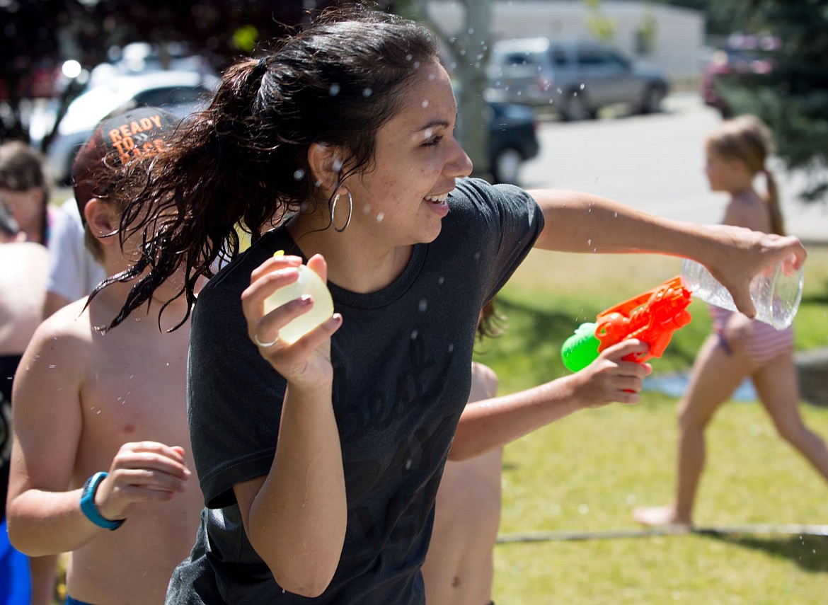 &lt;p&gt;KATIE HARTWIG/Press Nice Guiasso, age 19, of Coeur d'Alene enjoys times with the kids on water day at the Boys and Girls club in Post Falls, Friday. Guiasso is one of the 24 Americorps volunteers this summer.&lt;/p&gt;