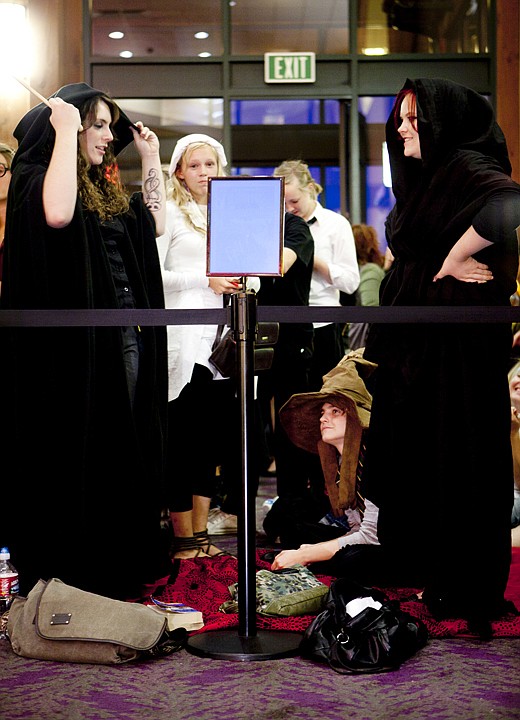 &lt;p&gt;Stephanie LeFeuvre (left) and Kay Gardner dress as Death Eaters
for the premier of &quot;Harry Potter and the Deathly Hallows, Part 2.&quot;
LeFeuvre and Gardner arrived at 3:30 Thursday afternoon to secure
the first position in line for the midnight showing at Signature
Theatres.&lt;/p&gt;