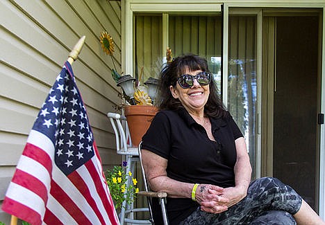 &lt;p&gt;Candace Alward, resident at Trail Lodge Apartment Complex, sits on her back porch of her apartment where she has lived on and off for the last 12 years.&lt;/p&gt;