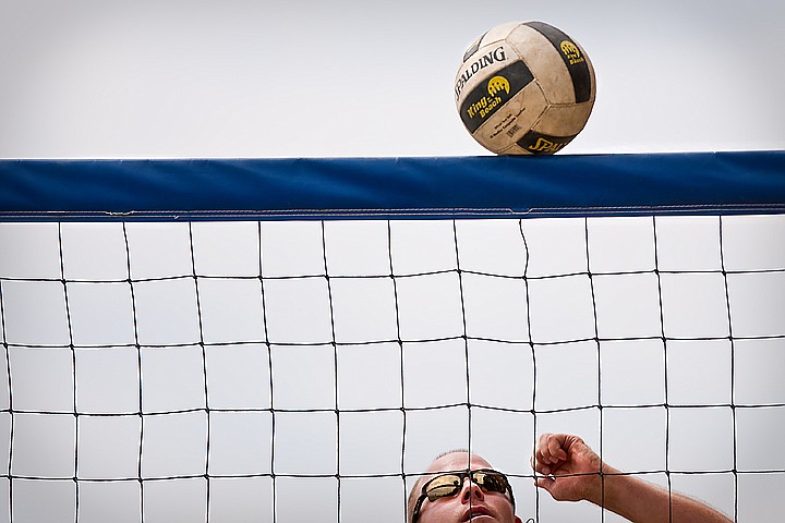 &lt;p&gt;BEN BREWER/Press Joe Snyder of Coeur d'Alene stares up at a volleyball hovering on the net during the beach volleyball tournament at North Idaho College beach on Saturday.&lt;/p&gt;